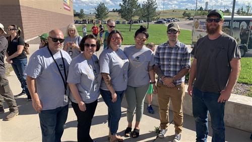 staff leaders gather at barbecue