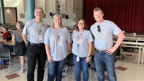 staff leaders gather at barbecue