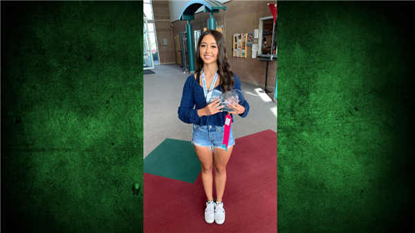  EHS student Ashlynn Wescott holding awards